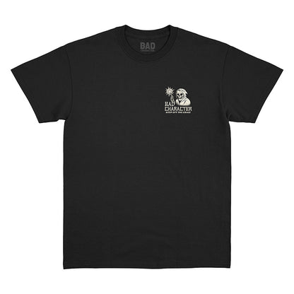 Front view of black t-shirt with small ‘Bad Character’ left chest print and ‘Keep Off the Grass’ graphic